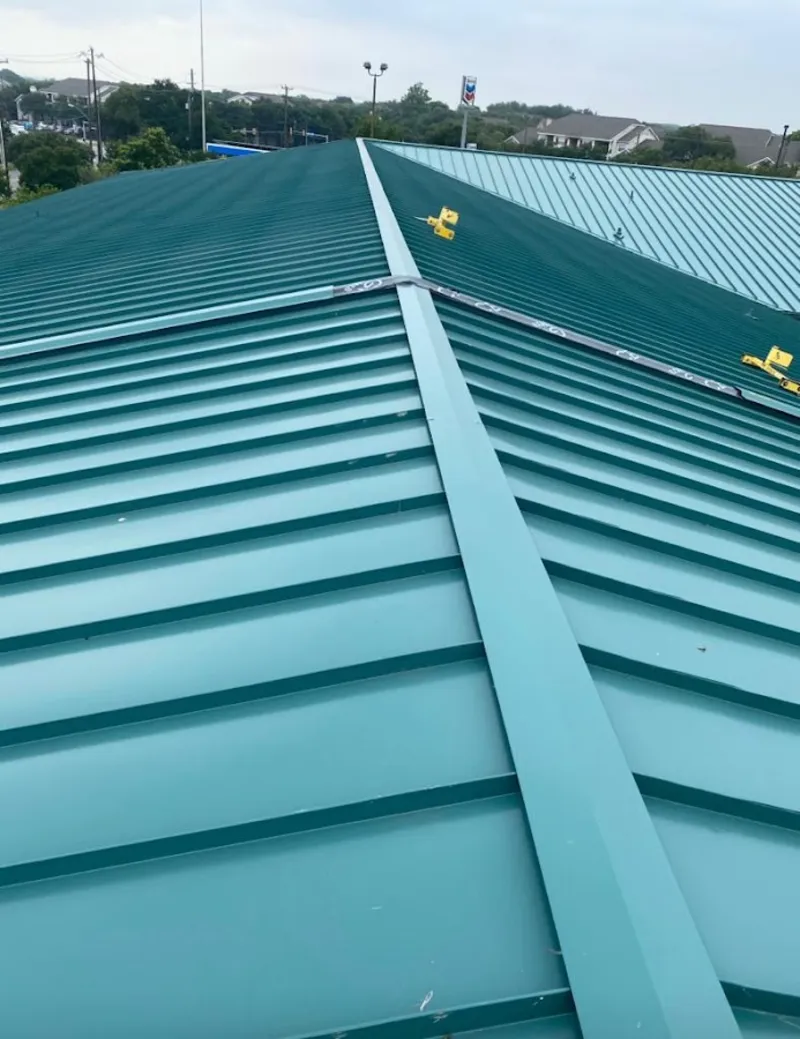 Green commercial metal roof ridge and valley for Metal Roof Repair in Little River